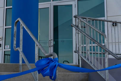 Entrance of Airsun Express’s new fully automated cold storage facility in Hazle Township, Pennsylvania, with a blue ribbon tied in front for the grand opening ceremony.