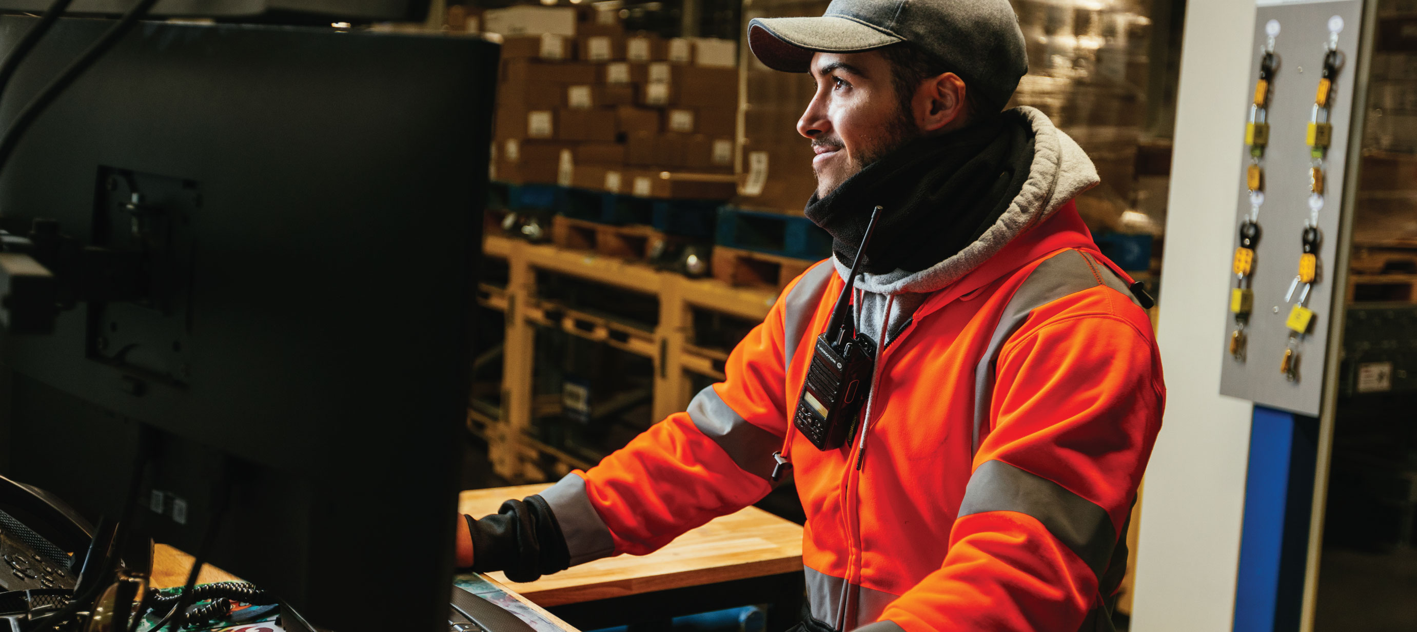 Airsun Express team member in cold storage warehouse, using the Airsun Express Link platform for real-time supply chain visibility.