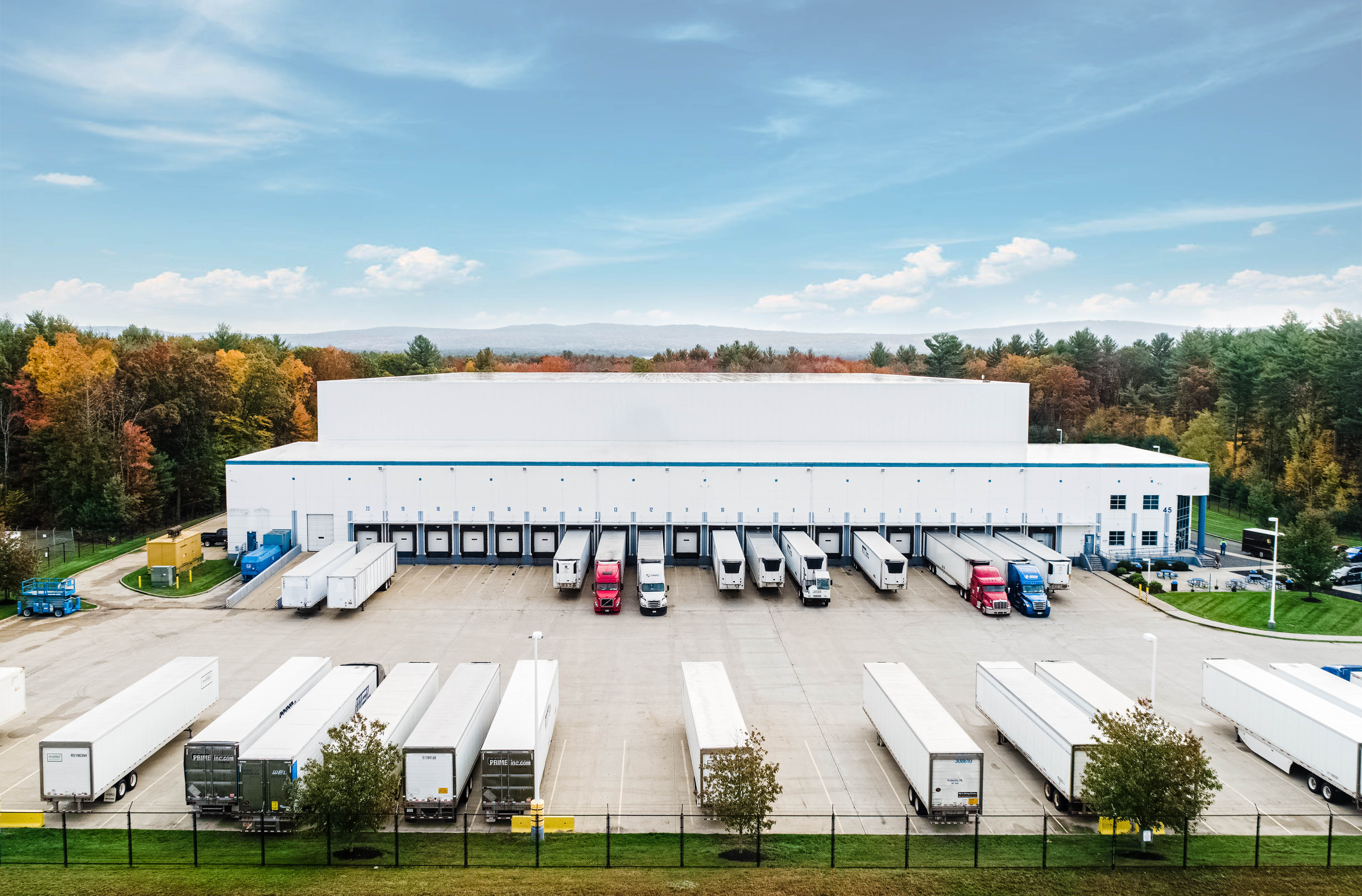 Exterior of Airsun Express warehouse with trucks