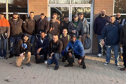 Group photo of Cohort 3 participants in the Airsun Express EDGE Program, gathered outdoors in front of a building, showcasing teamwork and leadership growth.