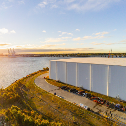 Exterior of warehouse at sunset